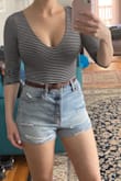 Lulus shorts are usually  too loose in the waist if I order a medium or too small in the hips/butt if I order a small. These fit really great waist is still a bit loose but a belt helps finish the look and cinch it in). Def order these, great deal for the price. I should have gotten both colors. - Emily M.