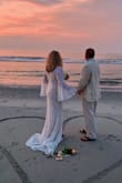 My fiancé and I decided to get married on the beach.. I was lucky enough to find this dress and have it delivered within a few days (I only had 8 days to prepare). The dress has a little give to it, so it fit nicely in all the right places. It was cut low (which was OK with me) and the length is long, but again, I loved the way it flowed behind me (I didn't wear heels). I received a ton of compliments on this dress. THANK YOU Lulus for a beautiful dress, efficient delivery, and a nice dress bag too! - Michele C.