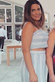 Definitely fits loose and the pants were a bit long but I wore high heels so I was fine. It felt like pajamas and I got a ton of compliments. Can also mix and match and wear each piece separate. - Joey M.