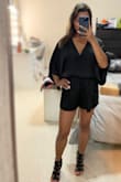 Can't go wrong with this black romper!! You can dress it up or down. I'd wear this on a date, night out with girlfriends. And it's a must have!! This will be another outfit I'd bring while on my trip in August. - Abigael M.
