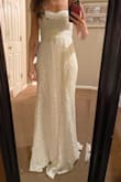 In love with this dress! Bought this for a simple wedding next month and couldn't be happier with the fit, fabric, color, and just the dress in general. I didn't want to spend more than $100 on a dress, but still wanted to look bridal. This dress is perfect! Slightly tight on me, but actually like that fact because I feel more secure in the tighter fit with it being strapless. Also long for me but should work fine with some tall heels. - Alyssa P.
