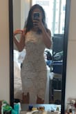 This dress is so flattering. It fits perfectly and it accentuates my figure in all the right places. The length was perfect even though I am quite short. Got many compliments and I feel so pretty in it! - Melanie N.