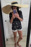 So I am a sucker for hats, especially big, floppy, sun hats. The bigger, the better! So when I saw this hat, I had to get it!!! This is by far the biggest sun hat I own (the brim is 11 inches wide!!) and I love it!!!! It will be perfect for when I go to the beach next month!!!!

I included a picture of it hanging on my wall, to give an idea of how massive this is lol (the black thing near the top edge of the brim is the tag). - Jessy C.