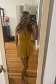Love this romper! It was so comfortable. The only bad thing is it wrinkles very easily. I ironed it and then drove to my destination, and it was wrinkled again by the time I got there. Otherwise, it's a beautiful romper!! Love the yellow color - Brittany K.
