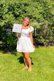 The dress is so cute I wore it for graduation. The zipper on the back gets stuck at the seam but is not a huge problem. it is super cute - Natalie M.