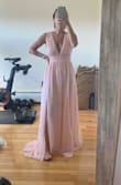 Love the style of this dress, it's flattering and comfortable. Tried it on in the blue and was disappointed that the blue material was MUCH heavier than the pink. The pink is pretty but you must wear light underwear as I could see my dark underwear through it. Unfortunately the pink may be too close to rhe bridesmaids of the wedding I'm going to so I may have to return anyway. But thought the dress is beautiful. - Emily S.