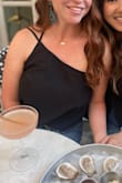 LOVE IT. Can easily be worn without a bra, and it the adjustable straps allow you to let it hang perfectly for your fit! - Monica N.