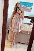 This dress is so cute. It's perfect for summer and I was able to wear it with a bandeau or without and it looked great. It's slightly oversized which I love. - Jeannette W.
