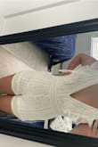 This romper is sooo pretty and would have been perfect for my bachelorette. I ordered a size up because typically I prefer my rompers loose. It fit me loosely at the top, but the bottom part is soo tight and short. Also the liner is longer than the leg part and sticks out. Have to return :( - Jillian M.