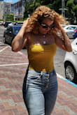 I usually order a small, but now I ordered a size larger because it looked like it's a little bit small, and it fits perfectly. I love the color, and it is very comfortable. - Taly S.