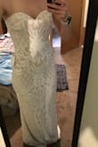 This dress is amazing! Very high quality for an amazing price! Classy and timeless for a ceremony and has some bling with the sequins that transition great to a reception!!! - Ashley G.
