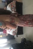 The material is heavy, but the look is gorgeous in the back. It runs a little big, but I didn't mind so much since it gave me room to play with adjusting the level of skin shown in the back. Pretty vintage floral print & can wear with a strapless bra thanks to bow placement. Skirt hit slightly above the ankle on me. It might be more of a maxi dress for someone more petite. - Molly B.