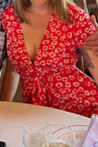 I love this dress! The deep V cut in the front can be revealing so I chose to wear pasties instead of a sticky bra with this dress. The center point was showing because the dress is cut deep in the front. But I got a ton of compliments! Very cute. - Alex C.