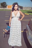 This dress is beautiful.. fit perfectly and was perfect for my courthouse wedding. The only lil flaw I found was that it was way too long.. - Anya H.