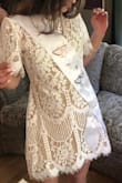Wore this at my bridal shower, fit perfectly, and received so many compliments on it! - Rachel O.
