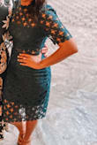 I wore this to a wedding & received so many compliments! There is not much stretch to it, but still runs true to size & is very flattering! - Jasmine D.