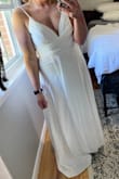 This dress is everything I dreamed of for my big day, the largest size is a 10, it fit everywhere except the top (wouldn't zip all the way up). My hips are definitely my widest location, and have a smaller chest and it was a fail. - JAMIE E.