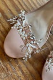 Got these for comfort and for its short heel as a tall person. I bejeweled them for my wedding using a hot glue gun. - Amy L.