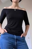 Flattering fit. I liked the top so much I bought a duplicate for when I wear through the original. - Amber B.