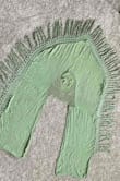 I like the way this shawl moves in the breeze. The majority of the fringes survived the first machine wash in a garment bag.

The entire shawl and a close up of the design on the back are pictured. - Amber B.