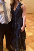 It was a bit long for me, felt more like a full length dress than a midi dress. But I am short. It was way too low cut for me but a sewed up the seem about an inch and it looked and felt a lot better. I got many compliments on it. - Lindsey V.