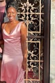Wore this unique dress to a pink-themed wedding. It's beautiful, and the style of the back of the dress is very sexy. It was also quite comfy. Got a boatload of compliments! My only (extremely minor) complaint was how wrinkled it got throughout the night. However I think that's just the nature of the material. I definitely recommend. The sizing was perfect for me. - CELES C.