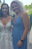 This dress was perfect. Wore it to a summer afternoon wedding. Received so many compliments! I was nervous since I am small chested thr top would move or gap, with the help of some double sided tape it fit perfectly! Stayed put, and did not look too scandalous. Will definitely be wearing again!! - Amy W.