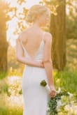Got this dress for a wedding photoshoot. It was PERFECT! I loved the low back and simplicity of the dress. It was super comfortable to walk around in (we were even hiking around a bit to get to some of the spots) and fit like a glove. The quality was really good as well. I plan on wearing it again at my wedding reception!! - Jamie M.