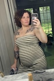 I have been looking for a dress like this and I'm so happy I found it! I want to wear it everyday. It fits well, the material is thick and not see-through at all, and has some stretch. It's not listed as a maternity item but it fits over baby bumps perfectly. 10/10 - Delta W.