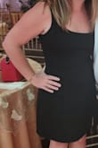 This dress fits perfectly. It's lined well. It has a nice stretch. I can even zip myself in and out of it. - Emily D.