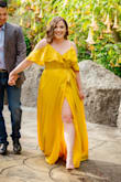 I loved this for my engagement sessions! I am short so it was a little long but the flow was perfect for the photos. I did have to mark it runs a little small only because of the bust. As a 34C the snap on the front would not stay for me but because of the design of the dress, a safety pin was hidden easily! Other than that the wrap is a perfect solution for any waist! I am counting down until I can wear it again! - Ashley C.