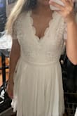 I was looking for an engagement shoot dress and this one checked all of the boxes! I wanted something modest but still cute and flirty. The V-neck is a bit deep on me, but it doesn't bother me too much since that's the only really revealing part of the dress. It fits well and flows nicely. I wanted a dress with short sleeves so that it hides my armpit fat. - Victoria C.