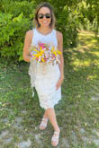 This was a perfect little dress for my daughter's bridal shower. She loved the two piece look! It was a little below the knees which she initially didn't like but then changed her mind and loved the fit throughout the whole event. - Taylor A.