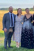 This dress was perfect for a summer outdoor wedding (ours was black tie optional, but it would blend in well at a more casual event too). It was flowy, but not too much fabric, very comfortable, and fit perfectly except the bust. I ended up wearing a low cut nude sports bra, pinning the center just enough to feel comfortable but maintain the look, and then using fashion tape to hold down the loose sides. I'd still recommend this dress to anyone in need of a different summer wedding look--just give yourself an extra day or two to fiddle with the top! - Emily W.