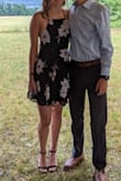 Wore this dress to a wedding and it looked great! it runs a little tight across the chest so I wouldn't recommend it if you have nicer boobs than me!! I needed help getting into it with all the crosses in the back as it got a little tangled and confusing, but it was definitely worth it! The material is a polyester type that needs to be steamed to get rid of the initial wrinkles and the pink is not as vibrant as in the original photos. - Louisa G.