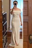 I exchanged the XS, which fit better in the bodice, for the S which is pictured in my photos and works better for me in the hips. Of the two dresses I'm wavering between, this is my friends' favorite because it's unusual and classy. The fabric is stretchy, smooth, and comfortable, and it feels like the top will stay put. I considered hemming it to just-below-knee length, because it is also beautiful that way. With a few inches off the hem (Photos show me in 3" heels), this may be the dress I end up with! - Gennevieve W.