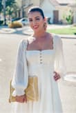 This dress is gorgeous! Did arrive very wrinkled, but easily took care of that with a steamer. The dress has a nice stretch to it. I'm usually between a size small or medium and the small fit perfectly. Received so many compliments on this dress! If you're thinking about it, get it! - Blanca J.