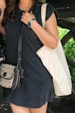 It has a relaxed, loose fit but I was not a fan of the shoulder pads. I found the pads easy to remove and the shoulders still have a nice ruched look to them after. The dress has gone through a couple of washes and still intact so thumbs up! - Pavithra R.