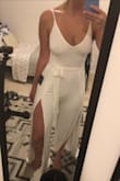 This is my favorite thing in my closet! I got it to wear for my bachelorette party. I saw a lot of reviews saying it runs big. Normally in these items, I buy a medium because I have a larger butt and thighs. I got a small and it is FIRE. Also, it's not as formal as the model pictures make it look. It is long on the bottom but I'm 5'4 and everything is long on me. I didn't have any problems with the straps with the small. Also, this fabric is stretchy and there is no zipper, so sizing down will fit you! - Brooke H.
