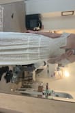 This looks nothing like the photo. The colour is awful. The fabric looks cheap. It is the frumpiest dress I have ever worn. Very disappointed and back to square one for my bridal shower. - Nikki V.