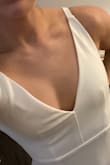 We are eloping to a red rock desert and I didn't want to spend a lot of money on something that would get dirty. This fit like a glove and I didn't want to take it off when I first tried it on. It will need to be hemmed, but that was expected. It's a very comfortable and stretchy material. I can't wait to wear this in October!

*Sorry for photo quality. The website wanted me to crop it in order to upload it, but the top half of it is gorgeous/classic. - Allison R.