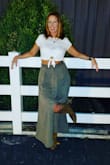 The whole outfit is from Lulus, except the boots. The quality of the skirt is great. I love this outfit. You won't be disappointed if you buy it. - Kanya N.
