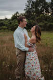 I used this dress for engagement photos and it was perfect! The small fit too, but I felt my boobs could pop out easily and didn't want any mishaps, so I went with the medium. I got so many compliments on it! - Victoria B.