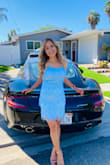 It runs on the tighter side. I would go up a size to have more room in the belly area. I got lots of compliments and it's a very sexy dress. Looks amazing with strap high heels. - Christine C.