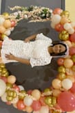 Perfect in my waist area but the sleeves were too big. They were definitely XL sleeves. But overall gorgeous dress. Wore for our wedding shower and received a lot of compliments. - Kathryn B.