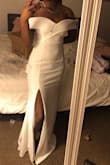 It's beautiful, comes with protective dress bag, shipping fast! Amazing. I'd purchase again - Alexis P.