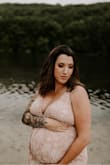 I purchased this dress for my maternity shoot. I had to buy a size up because they didn't have an XL available so it was a little loose on me however the straps in the back made it easy to adjust. I got many compliments! It was beautiful and showed so well in photos!! - Chelsea D.