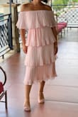At first I was hesitant to get a dress like this& but after many other fittings I decided to go with this trending tiered beauty for my best friends bridal shower.  quality material and the pink is lovely. I got so many compliments too! Love it - Shantay M.