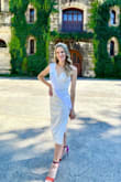 Loved this for my bachelorette party! Dress wrinkles very easily so I recommend steaming before wearing. But once we steamed it, the dress was super comfortable and beautiful! The lace detail on the back is very bridal. - Caitlyn G.