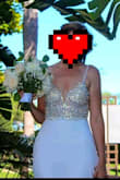 I ordered this for my small beach wedding and it was perfect. It travels nicely and looked so pretty in photos. I think it fits true to size for a Lulu's dress meaning it runs a little big and long. It works for me as a taller girl but worth noting. - Amie W.